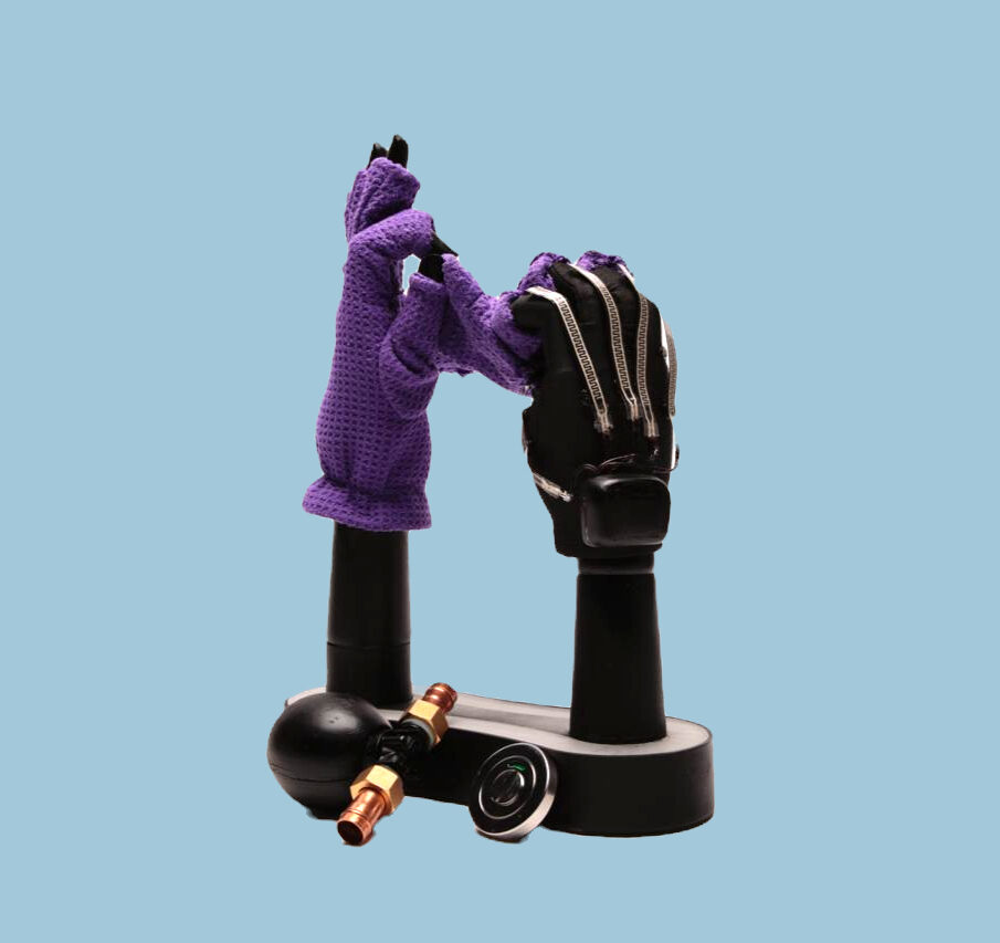 Hand with purple glove and a robotic hand
